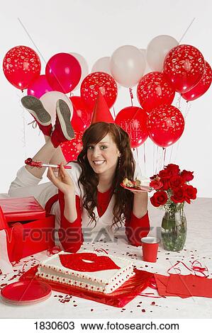 Girl with cake and red balloons View Large Photo Image Stock Image - Girl with cake and red balloons. Fotosearch