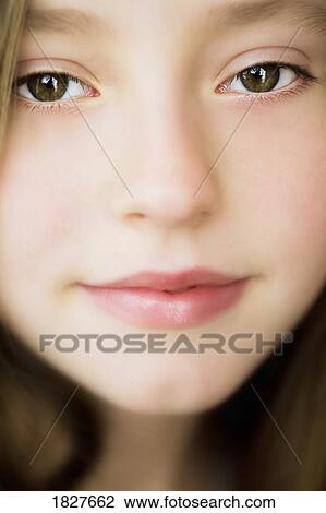 Stock Image - Girl's face. Fotosearch
