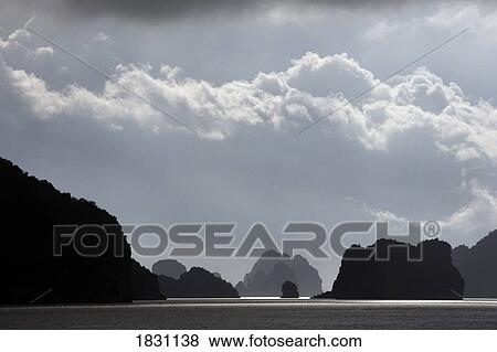 Halong Bay islands in the Gulf of Tonkin, Vietnam View Large Photo Image Stock Photo - Halong Bay islands in the Gulf of Tonkin, Vietnam. Fotosearch