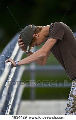 Stock Photo - Hanging his head. Fotosearch