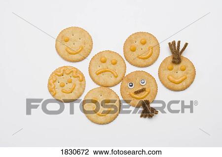 Happy and sad faced crackers View Large Photo Image Stock Image - Happy and sad faced crackers. Fotosearch