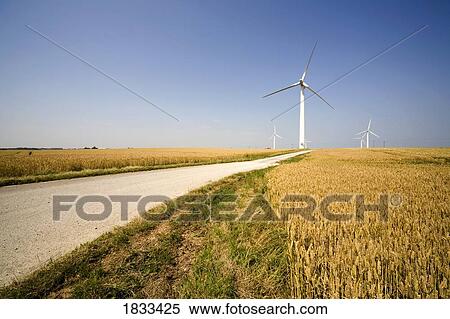 Humberside, England; Road to wind turbines View Large Photo Image Stock Photography - Humberside, England; Road to wind turbines. Fotosearch