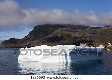 Stock Image - Iceberg, Port of Nanortalik, Island of Qoornoq, Province of Kitaa, Southern Greenland, Kingdom of Denmark. Fotosearch