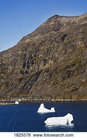 Icebergs, Port of Nanortalik, Island of Qoornoq, Province of Kitaa, Southern Greenland View Large Photo Image Stock Photo - Icebergs, Port of Nanortalik, Island of Qoornoq, Province of Kitaa, Southern Greenland. Fotosearch