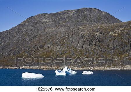 Stock Photograph - Icebergs, Port of Nanortalik, Island of Qoornoq, Province of Kitaa, Southern Greenland. Fotosearch