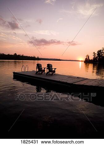 Lake of the Woods, Ontario, Canada, Adirondack chairs on a dock View Large Photo Image Stock Image - Lake of the Woods, Ontario, Canada, Adirondack chairs on a dock. Fotosearch