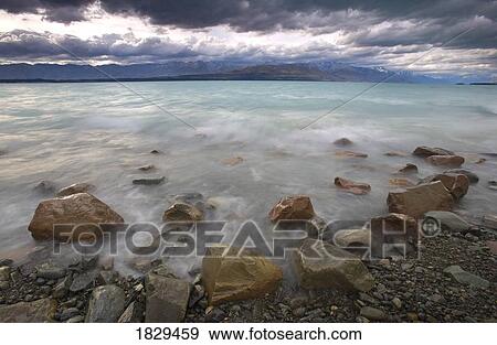 Stock Photo - Lake Pukaki, Southern Alps, New Zealand. Fotosearch