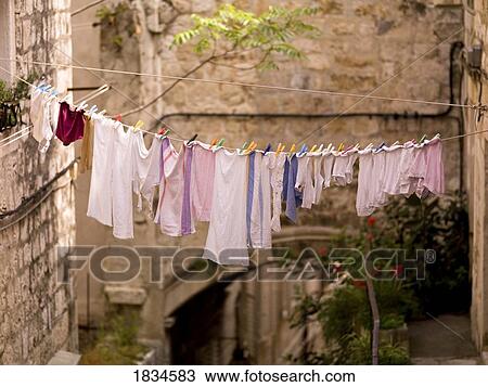 Laundry drying on the line View Large Photo Image Stock Image - Laundry drying on the line. Fotosearch