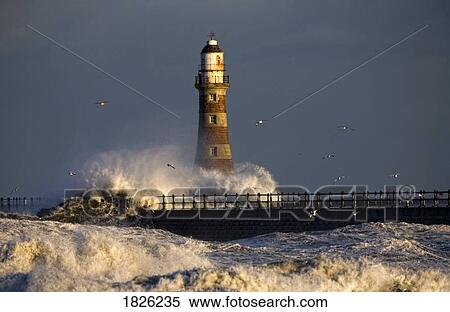 Lighthouse and waves, Sunderland, Tyne and Wear, England View Large Photo Image Stock Photography - Lighthouse and waves, Sunderland, Tyne and Wear, England. Fotosearch