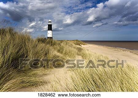 Stock Image - Lighthouse on beach, Humberside, England. Fotosearch