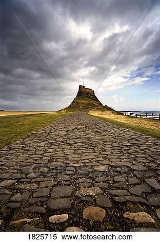Stock Photography - Lindisfarne Castle on a volcanic mound called Beblowe Craig, Holy Island, England. Fotosearch