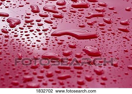 Liquid drops on red surface View Large Photo Image Stock Image - Liquid drops on red surface. Fotosearch