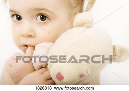 Little girl with teddy bear View Large Photo Image Stock Photo - Little girl with teddy bear. Fotosearch