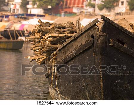 Picture - Loaded boat, Varanasi, India. Fotosearch