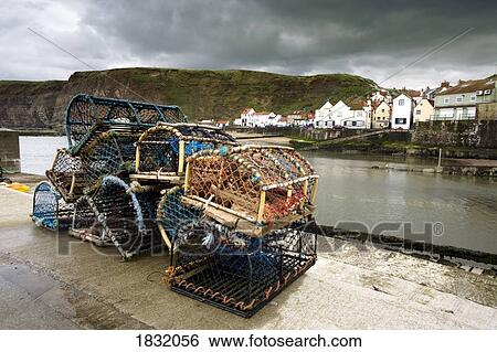 Lobster traps, Staithes, North Yorkshire, England View Large Photo Image Stock Photograph - Lobster traps, Staithes, North Yorkshire, England. Fotosearch