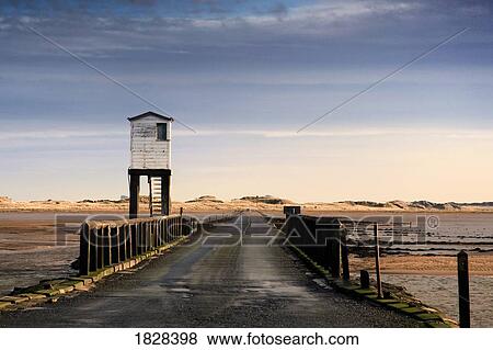 Stock Photo - Look-out tower by bridge, Holy Island, Bewick, England. Fotosearch