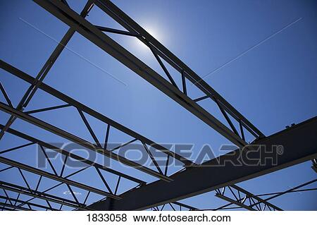 Stock Photo - Low angle view of building framing. Fotosearch