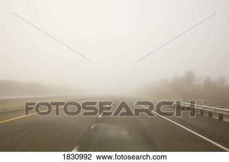 Low visibility on road View Large Photo Image Stock Image - Low visibility on road. Fotosearch