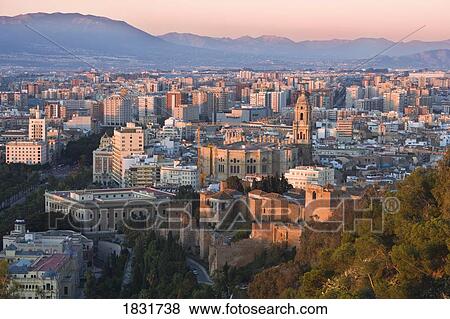 Malaga, Costa del Sol, Spain, view of the city and walls of the Alcazaba View Large Photo Image Stock Photo - Malaga, Costa del Sol, Spain, view of the city and walls of the Alcazaba. Fotosearch