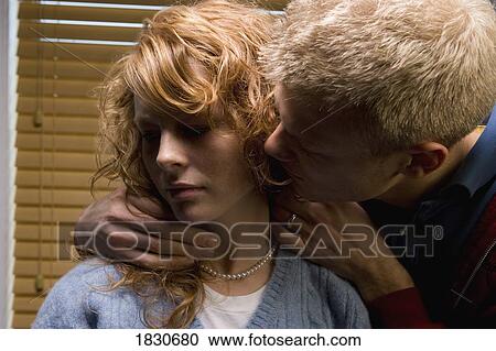 Stock Image - Man and unhappy woman. Fotosearch
