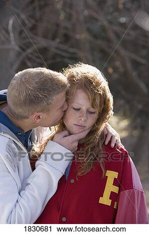 Stock Image - Man and unhappy woman. Fotosearch