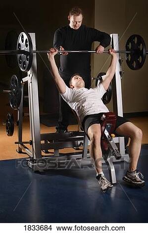 Man lifting weights View Large Photo Image Picture - Man lifting weights. Fotosearch