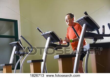 Stock Image - Man on a treadmill. Fotosearch