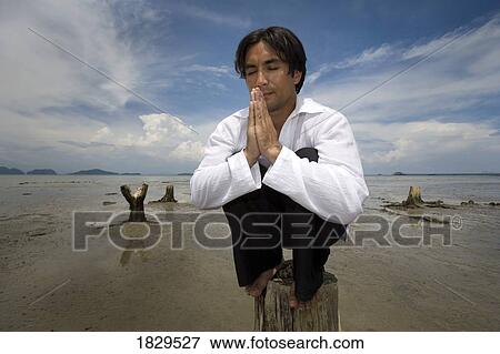 Man praying, Koh Lanta, Thailand, Asia View Large Photo Image Stock Photo - Man praying, Koh Lanta, Thailand, Asia. Fotosearch