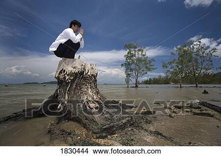 Man praying, Koh Lanta, Thailand View Large Photo Image Picture - Man praying, Koh Lanta, Thailand. Fotosearch