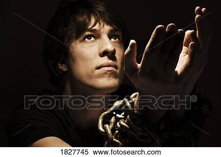 Man with chained hands View Large Photo Image Stock Photography - Man with chained hands. Fotosearch