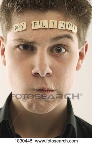 Man with the words 'my future' spelled with letter tiles on his head View Large Photo Image Stock Photography - Man with the words 'my future' spelled with letter tiles on his head. Fotosearch