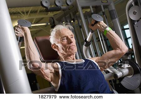 Man working out View Large Photo Image Stock Photo - Man working out. Fotosearch