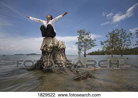 Man worshipping, Koh Lanta, Thailand, Asia View Large Photo Image Stock Image - Man worshipping, Koh Lanta, Thailand, Asia. Fotosearch