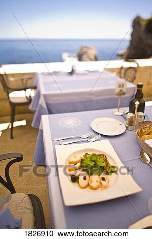Stock Image - Meal at outdoor restaurant, Atlas Club, Nautika-Dubrovnik, Croatia, Europe. Fotosearch
