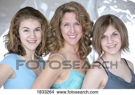 Mother and her two daughters View Large Photo Image Picture - Mother and her two daughters. Fotosearch