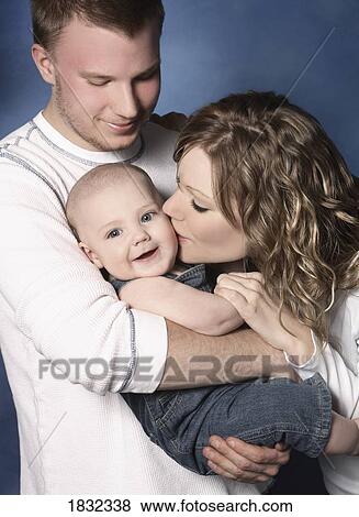 Stock Photo - Mother, father, child. Fotosearch