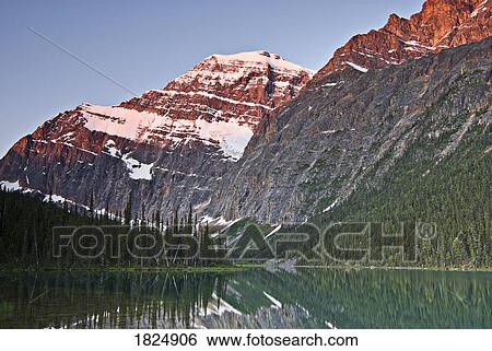 Stock Photograph - Mountain reflection, Mount Edith Cavell, Jasper, Alberta, Canada. Fotosearch
