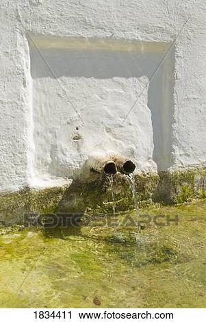 Stock Image - Mountain spring water outlet, Andalusia, Spain . Fotosearch