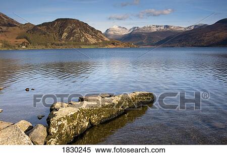Stock Photography - Mountains surrounding lake, Lake District, Cumbria, England. Fotosearch