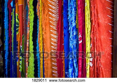 Stock Image - Multi-coloured fabric hanging. Fotosearch