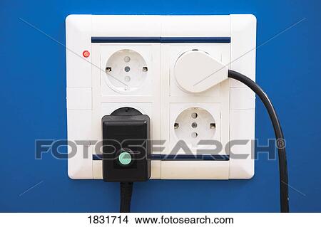 Picture - Multiplug electric socket, Power plugs. Fotosearch