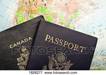 Stock Photo - Passports laid over a map of North America. Fotosearch