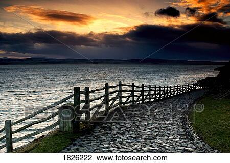 Path along the water, Holy Island, Berwick, Northumberland, England View Large Photo Image Stock Image - Path along the water, Holy Island, Berwick, Northumberland, England. Fotosearch