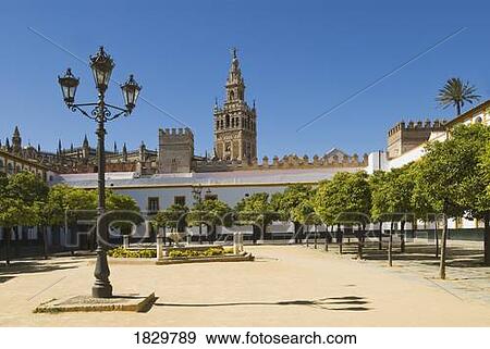 Stock Photo - Patio of flags, Seville Cathedral, La Giralda, Seville, Andalucia, Spain. Fotosearch