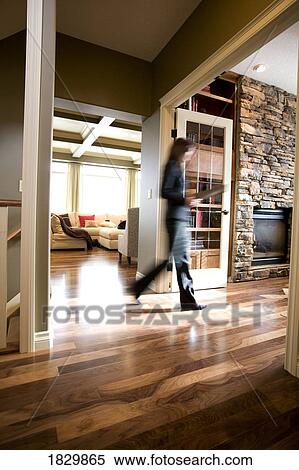 Person walking through house View Large Photo Image Stock Photography - Person walking through house. Fotosearch
