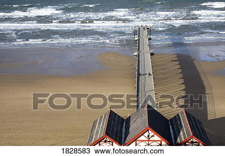 Pier on beach, Saltburn, North Yorkshire, England View Large Photo Image Stock Image - Pier on beach, Saltburn, North Yorkshire, England. Fotosearch