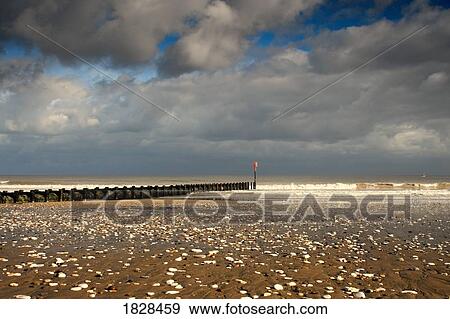 Stock Photo - Pier to the sea, Yorkshire, England. Fotosearch