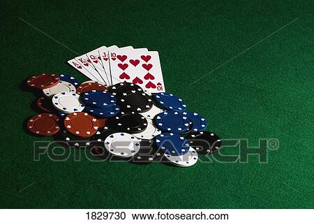 Pile of poker chips and cards on felt View Large Photo Image Stock Image - Pile of poker chips and cards on felt. Fotosearch