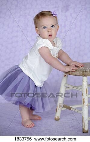 Portrait of a baby girl View Large Photo Image Stock Photograph - Portrait of a baby girl. Fotosearch