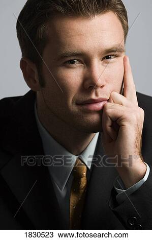 Stock Image - Portrait of a businessman. Fotosearch